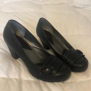 Low black button heels